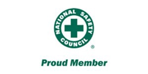 Sello «Proud Member» del Consejo Nacional de Seguridad, con un logotipo verde en forma de cruz médica sobre fondo blanco.